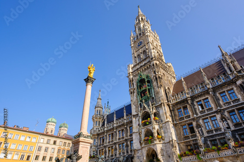 Germany, Bavaria, Upper Bavaria, Munich, New Town Hall, domes of?Frauenkirche?and?Mariensaule?column on?Marienplatz photo