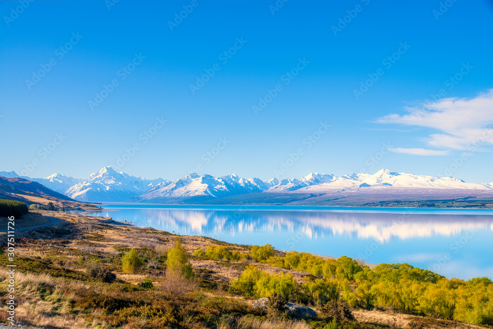 New Zealand, South Island, Scenic view of shore of Lake Pukaki with snowcapped mountains in background New Zealand, South Island, Scenic view of shore of Lake Pukaki with snowcapped mountains in background