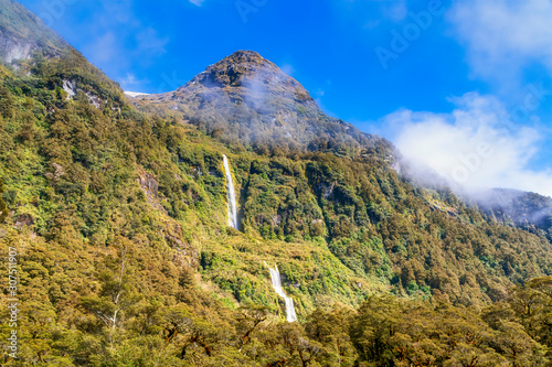 Scenic view of Cleve Garth Falls on mountain in Fiordland National Park at Te Anau, South Island, New Zealand photo