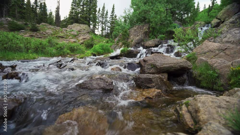 Relaxing scene of water cascading down hill Relaxing scene of water cascading down hill