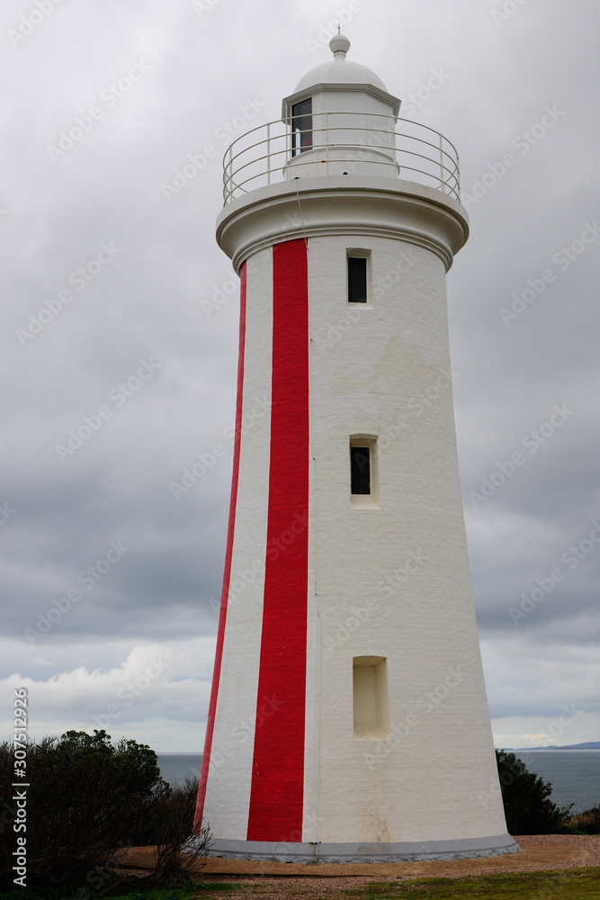 lighthouse on shoreline Tasmania 