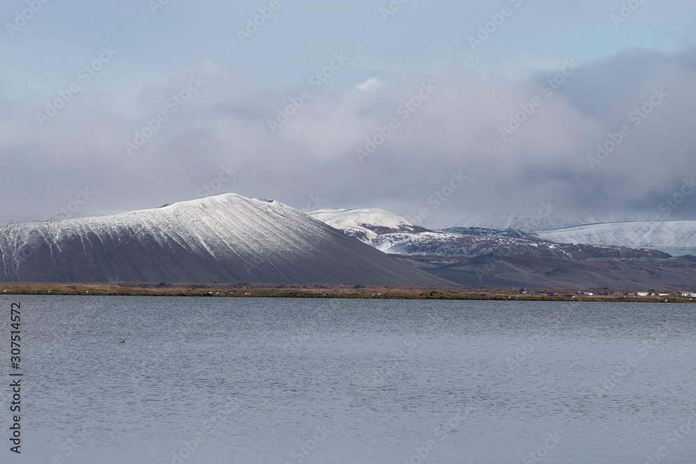 lake view of Hverfjall Crater with snow