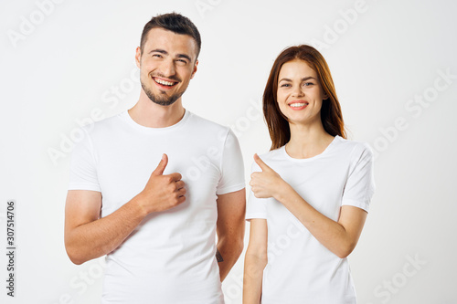 happy couple with thumbs up