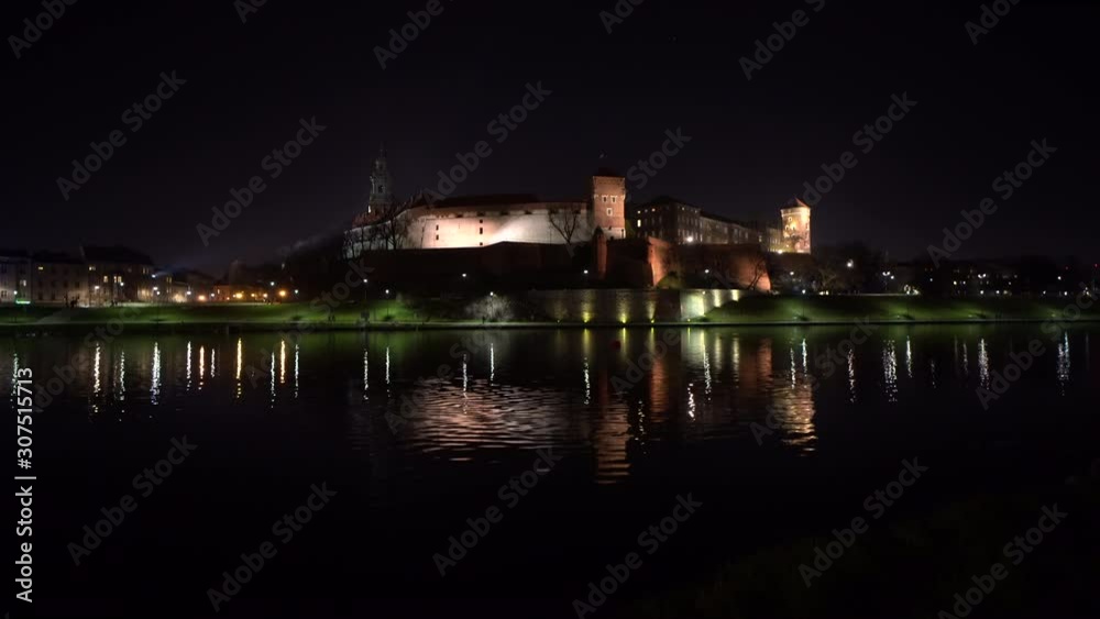 Royal Wawel Castle illuminated at night reflecting in the Vistula river, Krakow - Poland 4K Royal Wawel Castle illuminated at night reflecting in the Vistula river, Krakow - Poland 4K