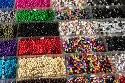 Beans in boxes multi-colored of different sizes and styles sold n local market in Greece