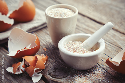 Canvas Print Mortar of crushed eggshell, whole and powdered eggshells, natural calcium, nutrient product