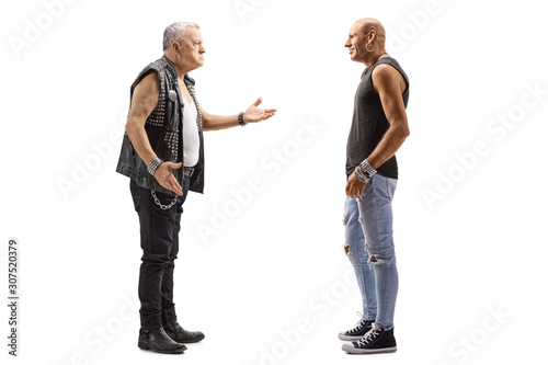 Elderly punker talking to a male hipster
