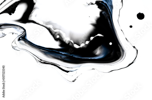 Liquid black ink in water. Marble art effect. Creative abstract artistic background.