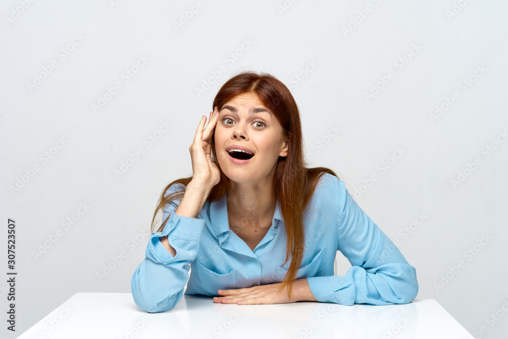 portrait of a young woman sitting on sofa