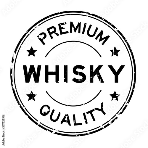 Grunge black premium quality whisky word round rubber seal stamp on white background