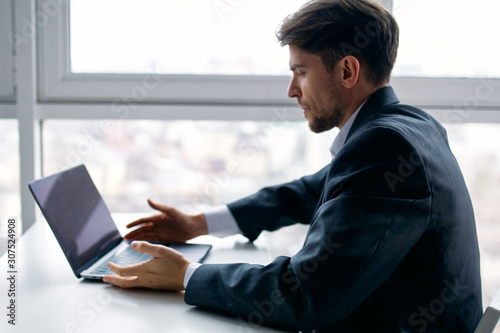 young man working on his laptop