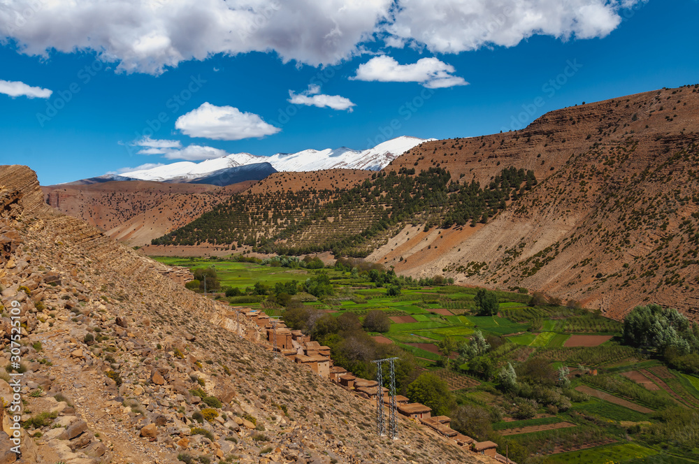 Overview on the Aït Bouguemez valley with high snow-capped mountains in Morocco