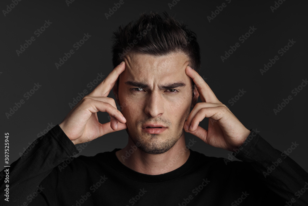 young man with headache young man with headache