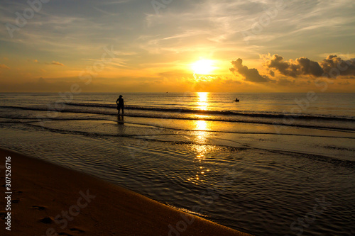 Sunrise and fisherman morning at the beach Ban Krut