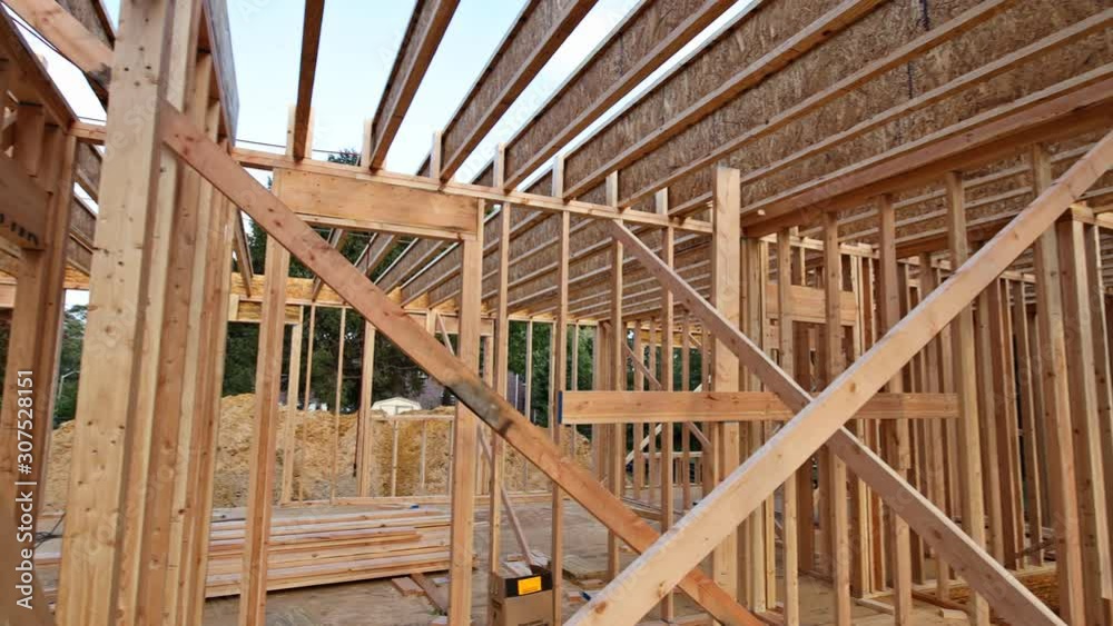 20 March 2019 Sayreville NJ USA The frame of a wooden house on a unfinished object in close up a new house under contruction frame 20 March 2019 Sayreville NJ USA The frame of a wooden house on a unfinished object in close up a new house under contruction frame