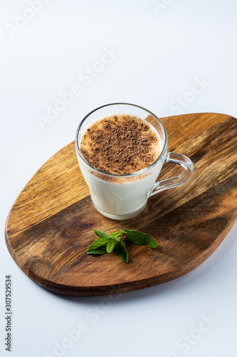 kefir in a glass  fermented drink  sour milk  with cinnamon