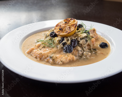 Chicken marsala topped with fresh mushrooms. A creamy and delicious Italian dish