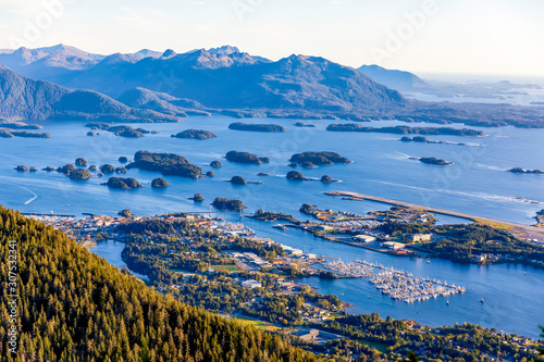 View of town, harbor, island, forest photo
