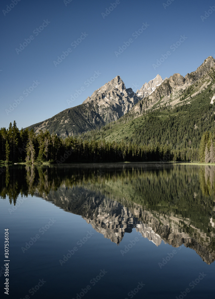 Reflection of Tetons Range in String lake