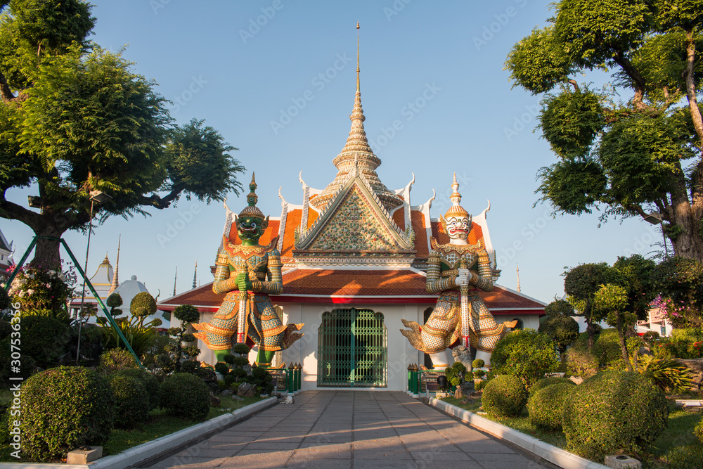 Temple of Dawn or Wat Arun Ratchawararam new look after renovation beside Chao Phraya River opposite Grand temple, Bangkok, Thailand.