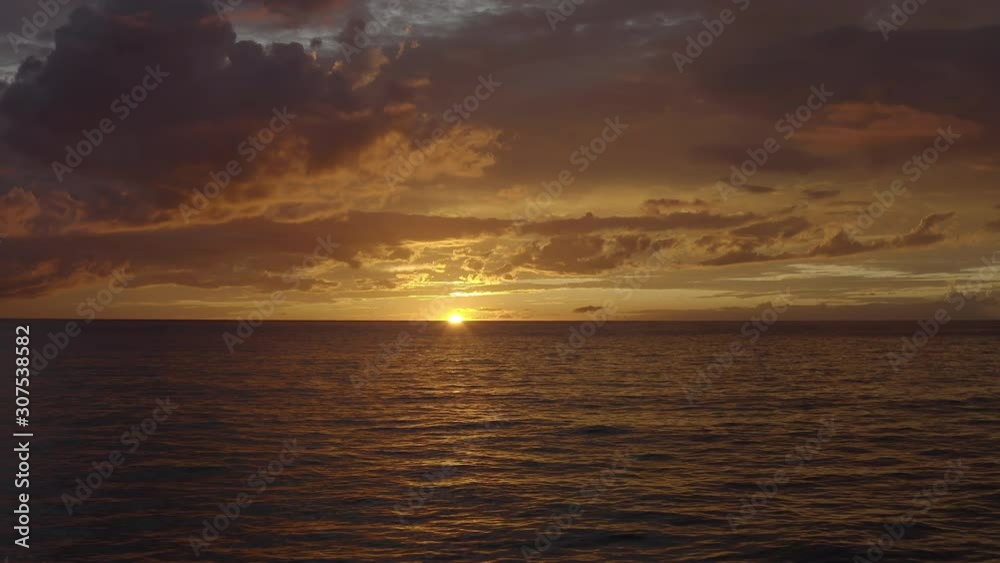 Drone shot of an amazing sunset over the ocean in Caribbean Drone shot of an amazing sunset over the ocean in Caribbean