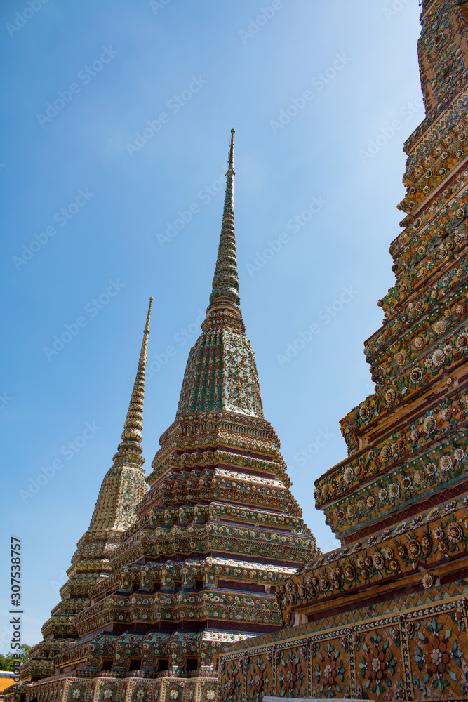 Stupas in Wat Pho(The Temple of the Reclining Buddha) in Bangkok , Famous temple in Thailand .