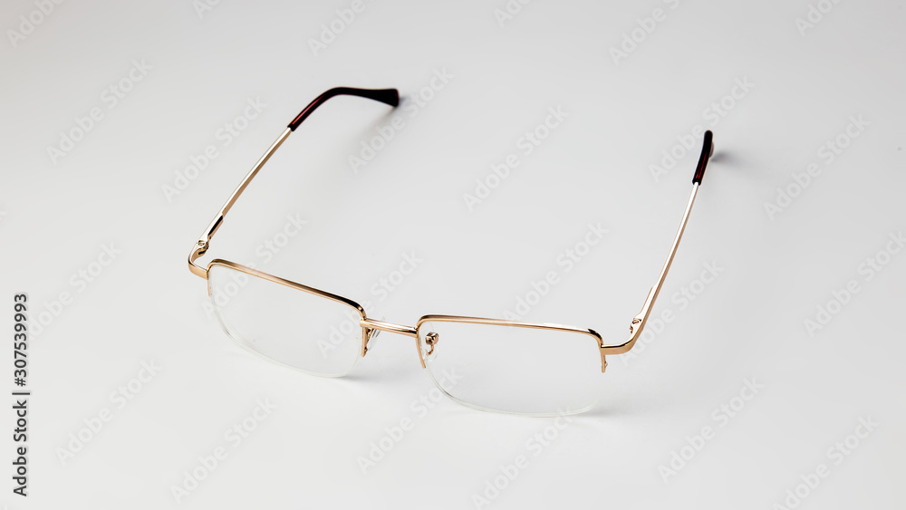 Gold eyeglasses on white background isolate Gold eyeglasses on white background isolate