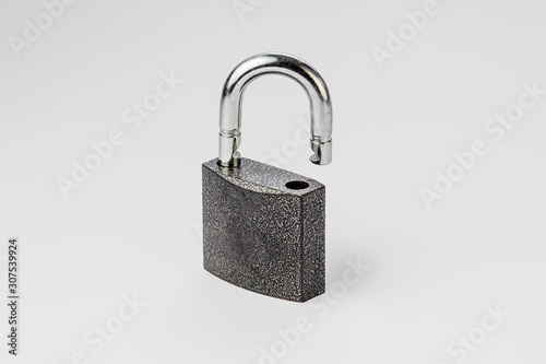 open lock on grey background isolate