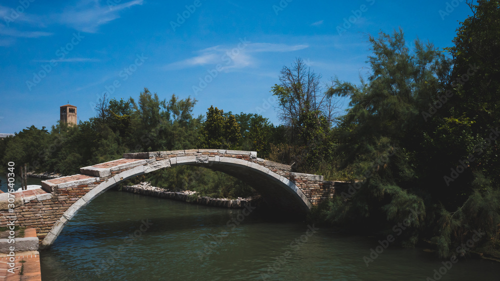 Devil's bridge over canal on island of Torcello, Venice, Italy Devil's bridge over canal on island of Torcello, Venice, Italy