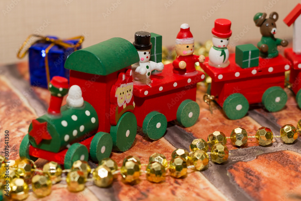 Obraz premium Christmas wooden toy trains, red-green