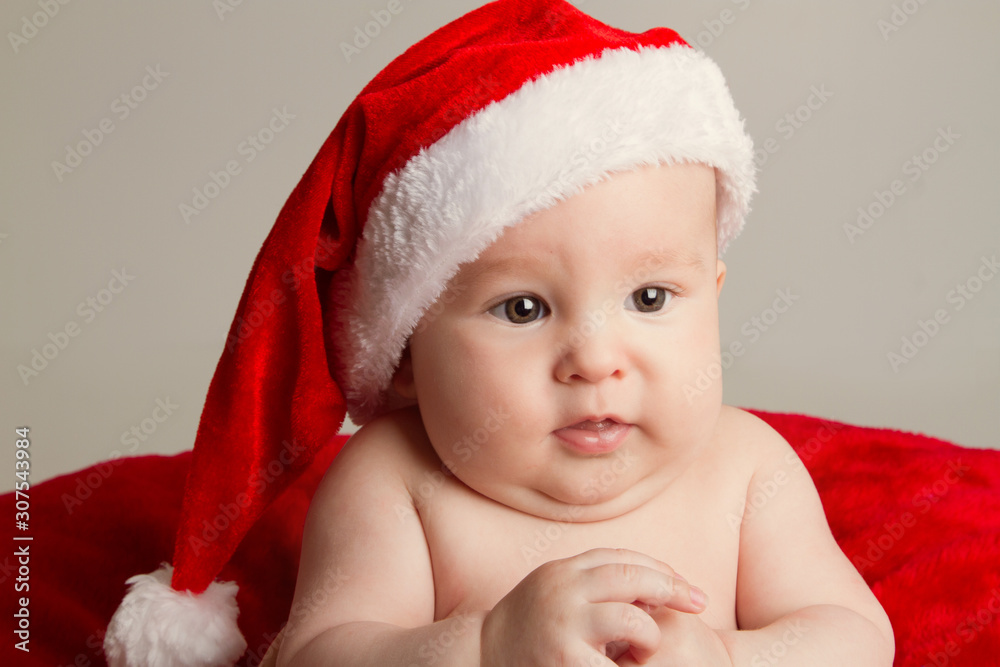 Baby with Santa hat, christmas portrait Baby with Santa hat, christmas portrait