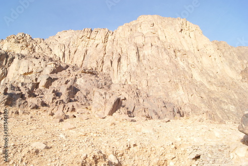 big pink mountain against the blue sky