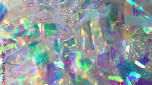 Holographic iridescent neon gradient background. Abstract blurred foil texture with multiple rainbow colors