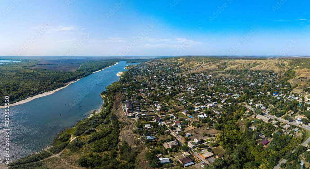 transparent Don river surrounded by forest, sandy roads and beaches near the village of Razdorskaya on a hot and sunny day in mid-August (South of Russia, Rostov Region, aerial view)