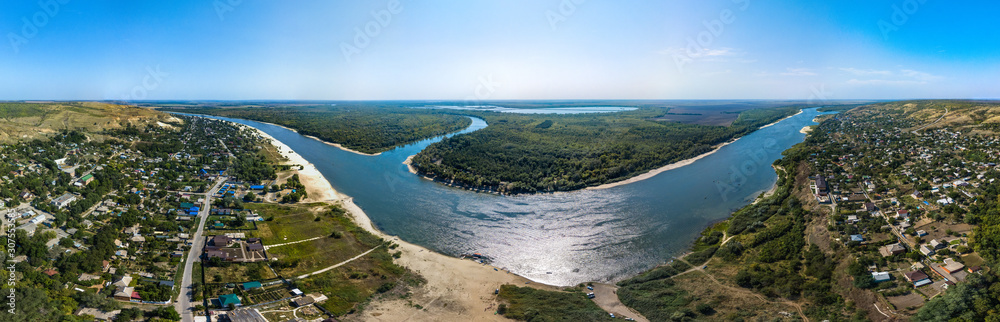 transparent Don river surrounded by forest, sandy roads and beaches near the village of Razdorskaya on a hot and sunny day in mid-August (South of Russia, Rostov Region, aerial view)