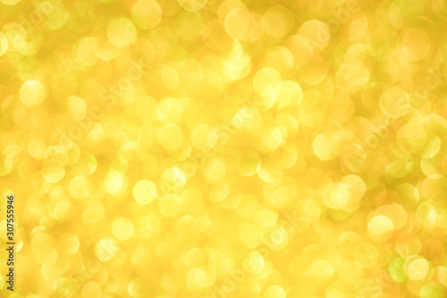 Luxury gold glitter with bokeh background, de-focused. concept for chrismas, holiday, happy new year, festive decoration.