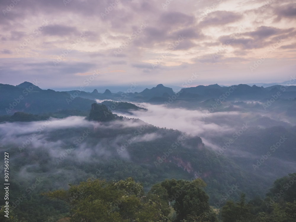 Mist over the morning peak in Mae Hong Son Province, Thailand Mist over the morning peak in Mae Hong Son Province, Thailand