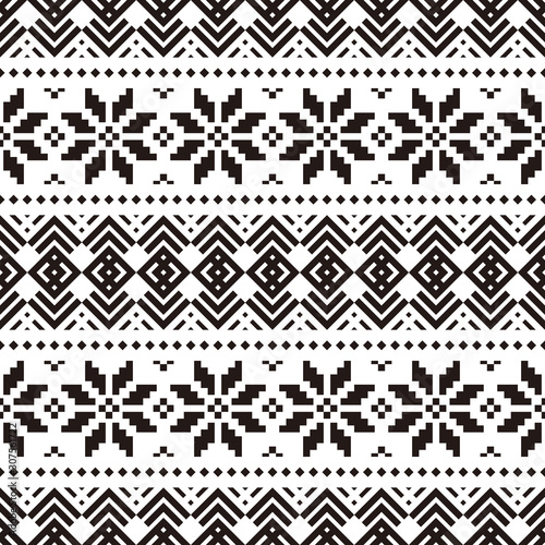 Geometric Christmas Ethnic pattern on white background. Ornament. Border. Seamless sample. It can be used as a background. Vector illustration