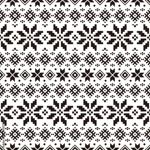 Geometric Christmas Ethnic pattern on white background. Ornament. Border. Seamless sample. It can be used as a background. Vector illustration