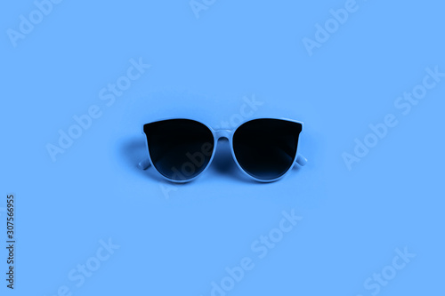 Beautiful trendly sunglasses isolated on a pink background