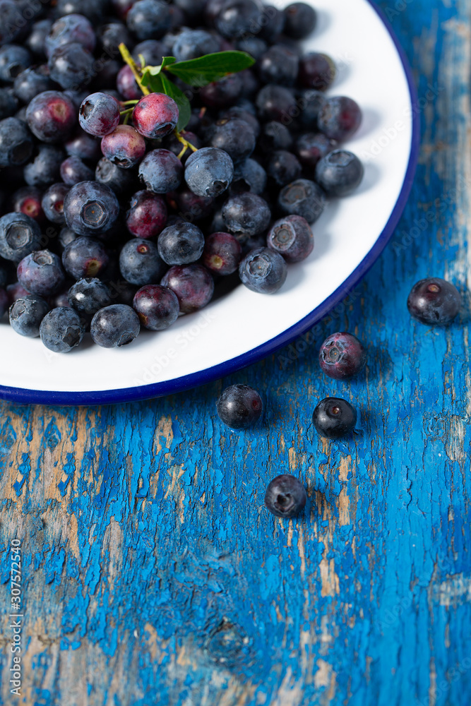 fresh blueberries in a metallic bowl fresh blueberries in a metallic bowl