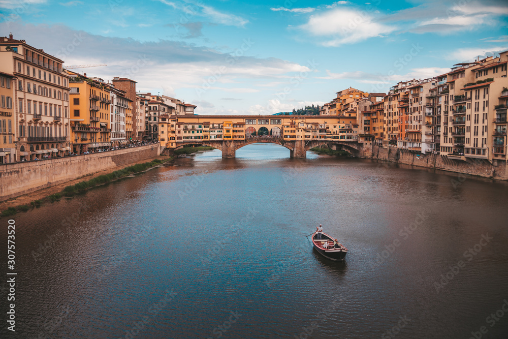Fototapeta premium River Arno with Ponte Vecchio in Florence, Italy