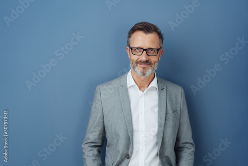 Smiling friendly professional man wearing glasses