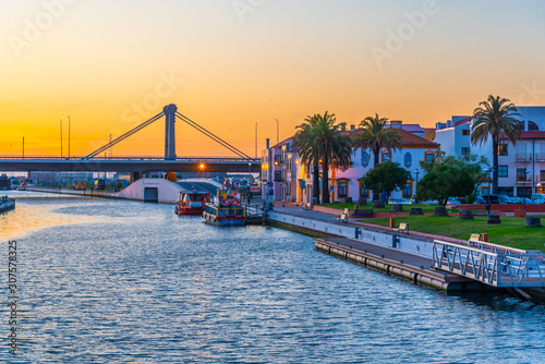 Moliceiro boats mooring alongside the central channel at Aveiro, Portugal