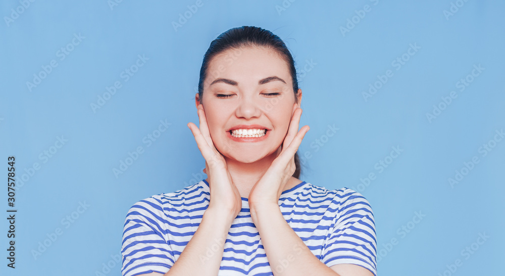 Smiling woman mouth with white healthy teeth on blue background. Smiling woman mouth with white healthy teeth on blue background.