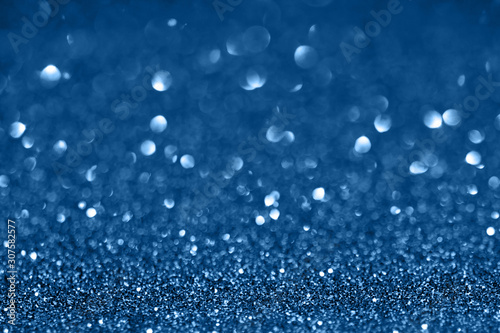Blue glitter monochrome background.