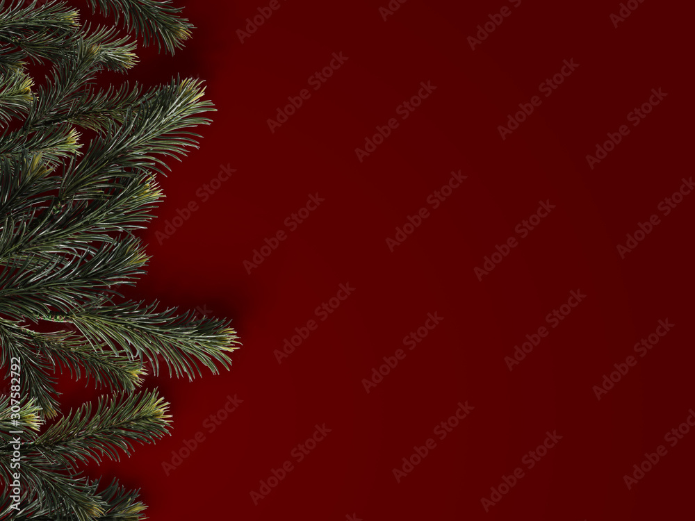 Christmas fir branches with copy space on red background. Christmas fir branches with copy space on red background.
