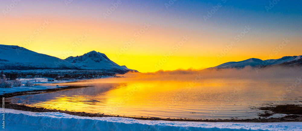 Sunset over Tromso.Norway.Coast of the Norwegian Sea.