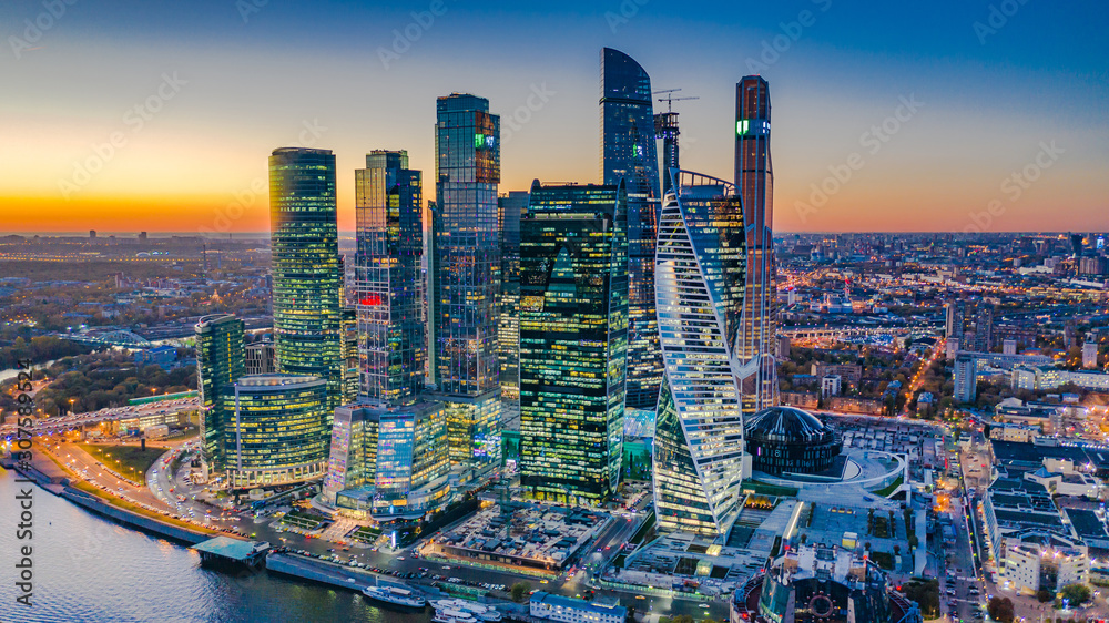 © Kalyakan - Aerial view Moscow City skyline and skyscraper building construction architecture, Moscow City international business and financial center at sunset with Moscow river, Russia.
