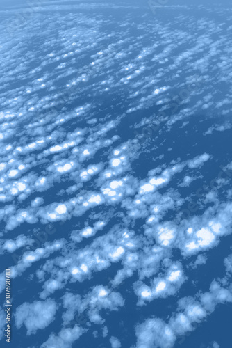 Clouds and sky view from airplane window. Abstract monochrome texture. Trendy blue and calm color. Copy space